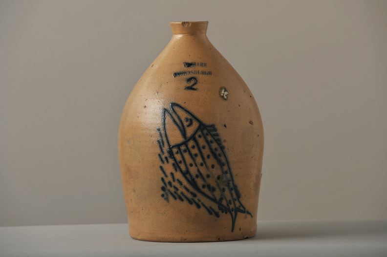 Stoneware jug with fish